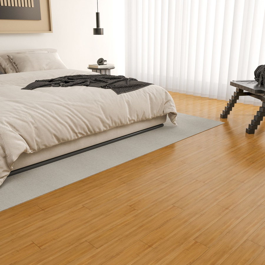 Light honey bamboo flooring installed in a bedroom
